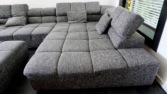 Image 1 of Moderne Grijze Hoekbank met Hocker - Comfortabel en Stijlvol