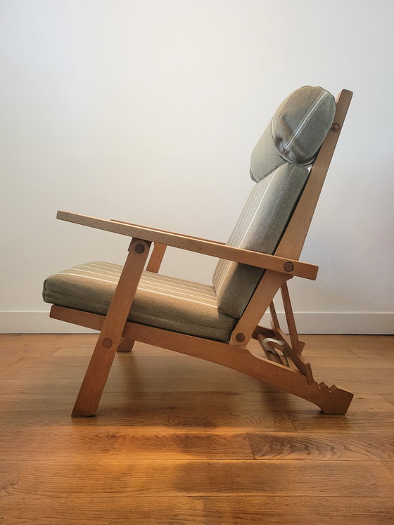 Image 1 of Fauteuil en Voetenbank van Hans J. Wegner voor AP Stolen