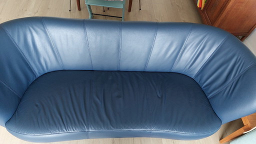 Dark blue Leolux three-seater sofa