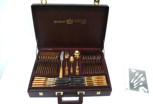 70-piece cutlery set by SBS Solingen model Athen, 24 carat hard gold-plated, in case, 60s 70s