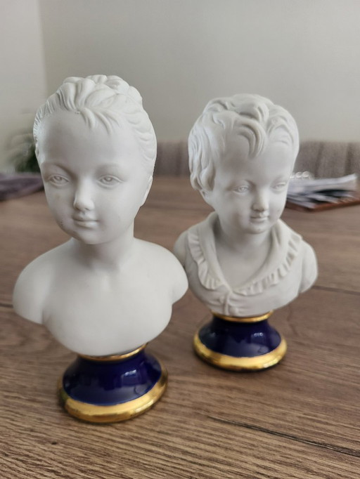 Porcelain white heads male and female