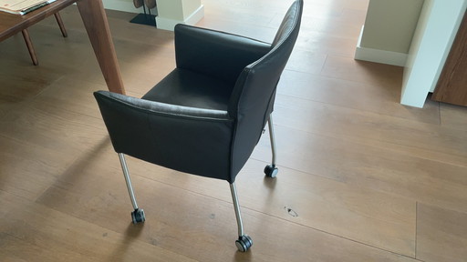 8 Design on stock leather dining chairs.