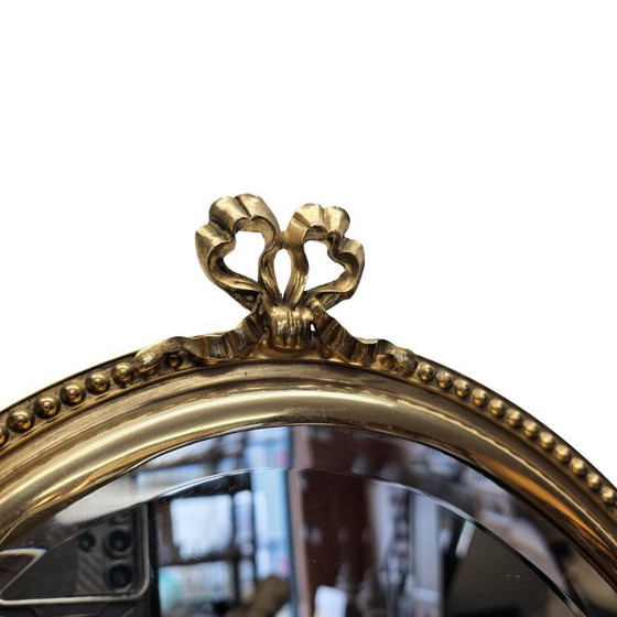 Image 1 of French style brass mirror with bow
