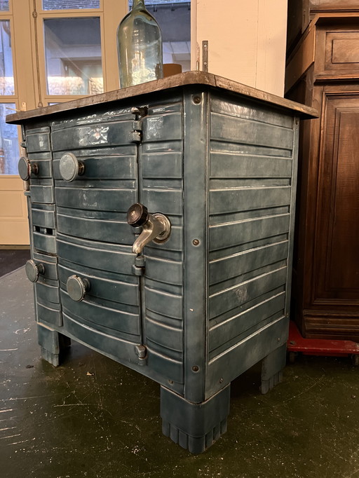 Small enameled cast iron wood-burning stove