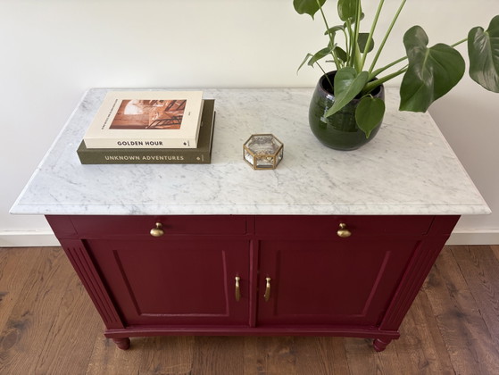 Image 1 of Bordeaux red sideboard with marble top
