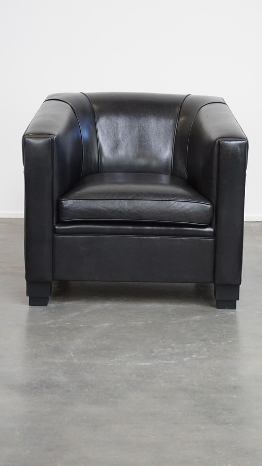 Fauteuil Art Déco noir en peau de mouton