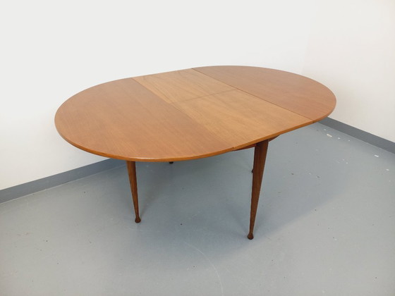 Image 1 of Vintage Scandinavian style round teak dining table from the 1950s/60s with extension