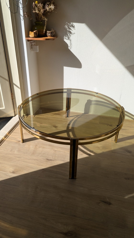 Image 1 of Hollywood Regency salontafel van zwart messing en gerookt glas