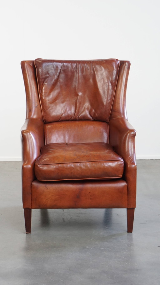 Fauteuil/chaise en cuir de boeuf couleur cognac