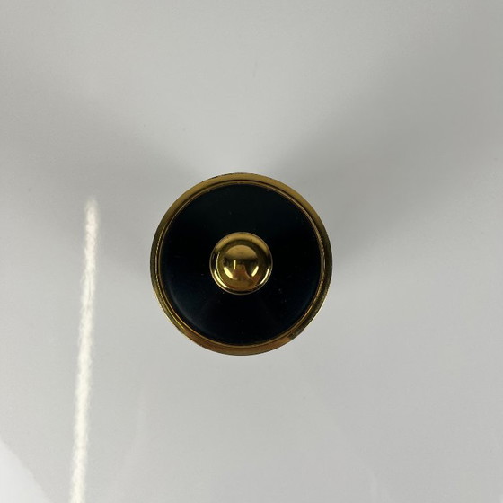 Image 1 of Sigarettendispenser/houder van zwart en goudkleurig metaal, jaren 60/70.