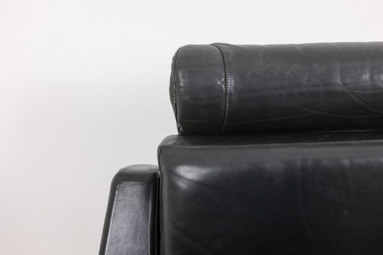 Image 1 of Airborne. Een paar groene leren fauteuils. Jaren 50.
