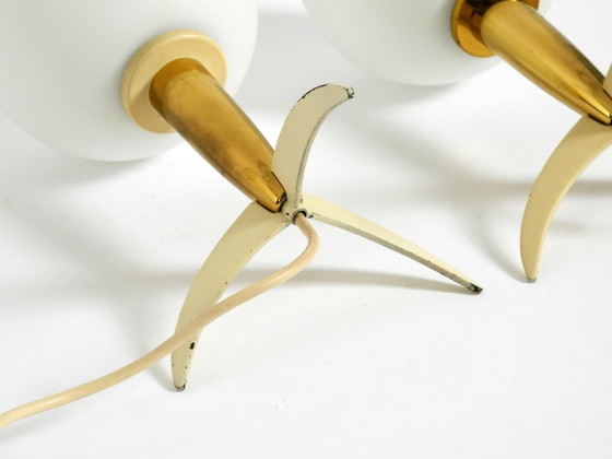 Image 1 of Two Mid-Century Modern rocket table lamps in brass and glass