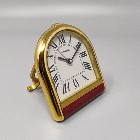 Image 1 of Cartier "Romane" reis- en bureauwekker uit de jaren 80, verguld met 18 karaats goud, inclusief originele doos en papieren.