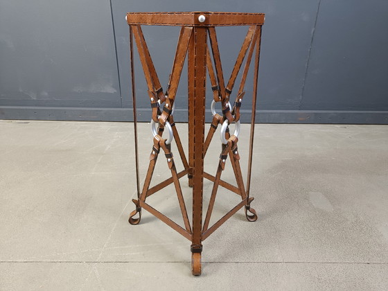 Image 1 of tavolino in ferro in ecopelle attribuito a jacques Adnet, anni '70