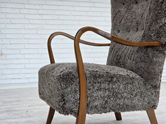 Image 1 of 1960s Reupholstered Danish Armchair with Stool, Genuine Sheepskin