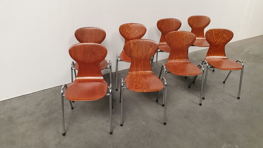 8x Eromes Pagholz stapelbarer Designerstuhl