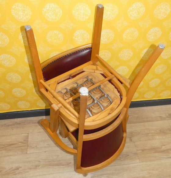 Image 1 of Armchair upholstered spring core skai leather oxblood decorative rivets office chair 60s retro