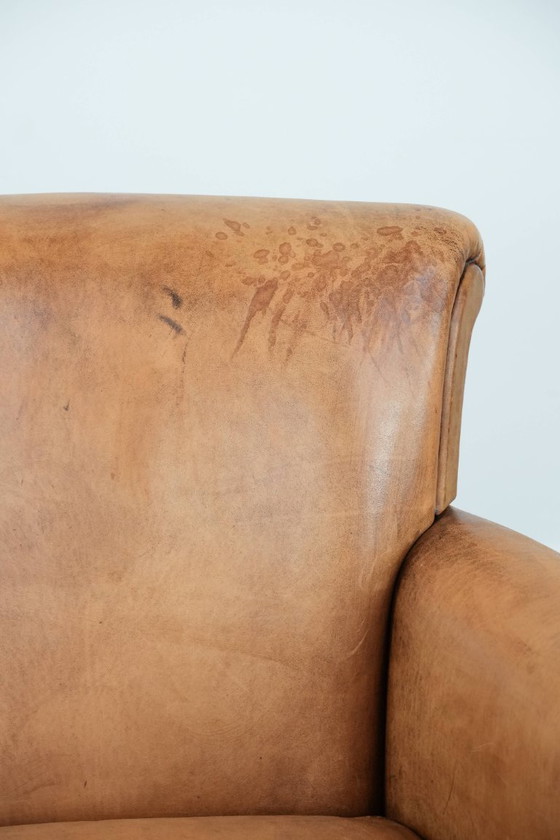 Image 1 of 2 x Subtiele vintage schapenleren fauteuil met een mooie lichte kleur