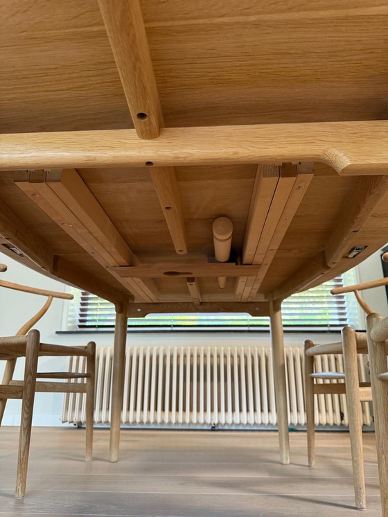 Image 1 of Carl Hansen & Son dining table with chairs