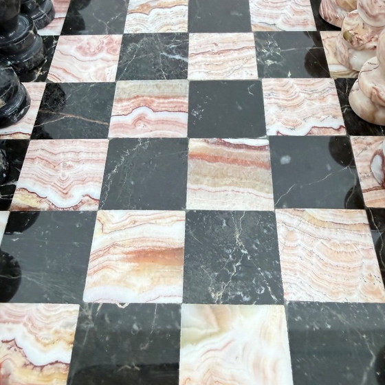 Image 1 of Scacchiera in marmo anni '70 rosa con bordo nero e rame