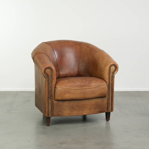 Gelebter Club-Sessel aus Schafsleder mit schöner Vintage-Patina und bequemem Sitz