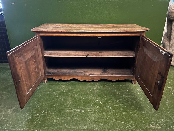 Image 1 of A very small rustic walnut sideboard