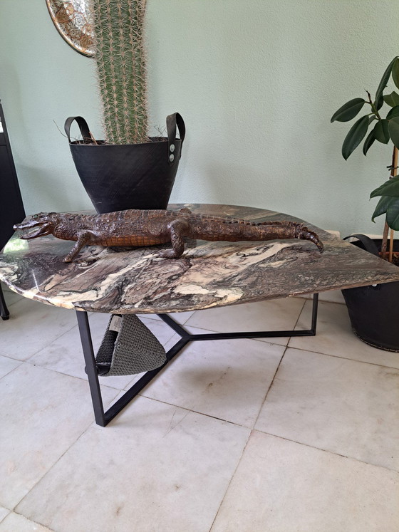 Image 1 of Marble coffee table with coated black base