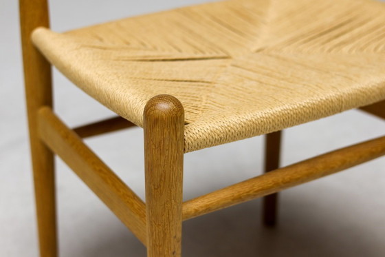 Image 1 of HANS J. WEGNER PP75 DINING TABLE IN OAK WITH ELEVEN OAK CH36 DINING CHAIRS