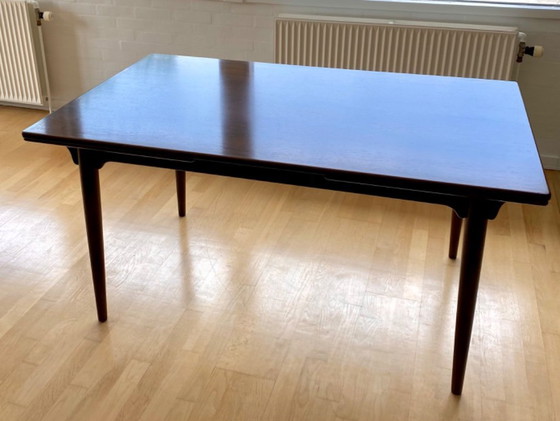 Image 1 of Rosewood dining table designed by Arne Vodder