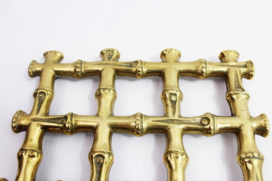 Image 1 of Onderzetter van imitatie bamboe en messing