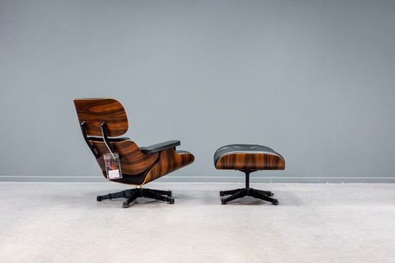 Image 1 of Eames loungestoel + voetenbank "jubileumeditie"