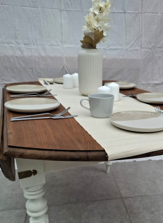 Image 1 of 🪵 Solid oak table with drop leaves — white lacquered legs — vintage chic style