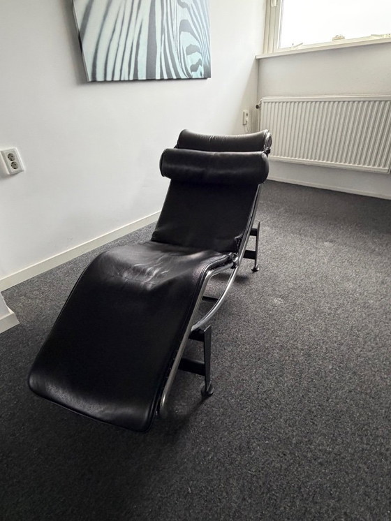 Image 1 of Corbusier lounge chair in black leather with a silver frame and black base