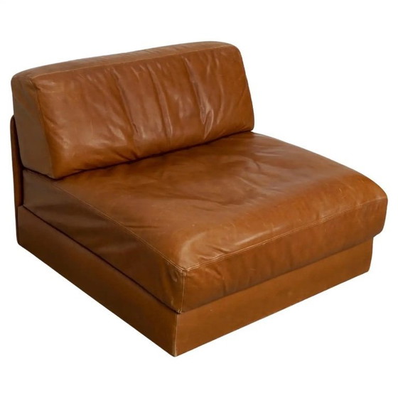 Image 1 of De Sede DS 76 loungestoel / slaapbank van cognackleurig leer, Zwitserland, jaren 1970