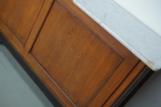 Image 1 of Gran mostrador antiguo Art Déco de chocolate alemán de roble y mármol, década de 1920