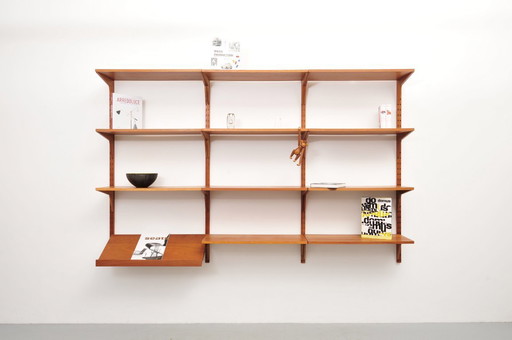 "Royal System" wall shelf made of teak by Poul Cadovius for Cado (1950s)