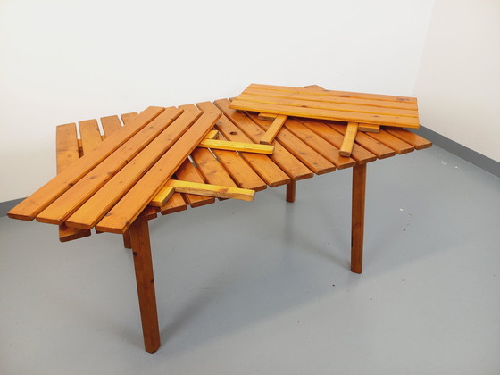 Image 1 of Vintage garden furniture consisting of a table with extensions and 4 wooden armchairs from the 60s