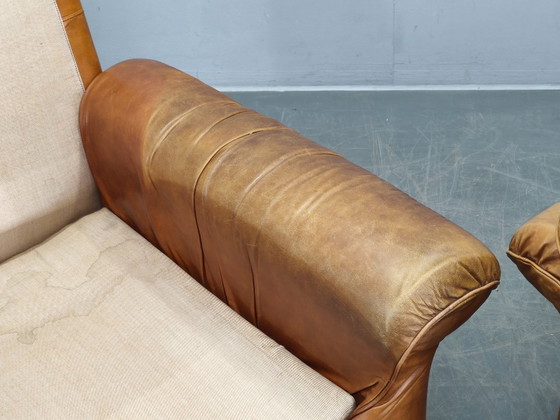 Image 1 of Een paar Arcon Italia loungefauteuils van cognacbruin buffelleer.