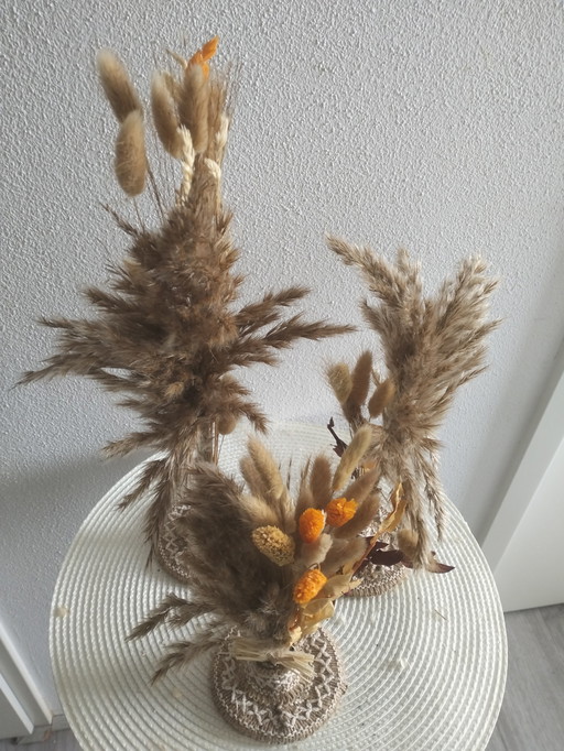 Kunstwer van droogbloemen 
