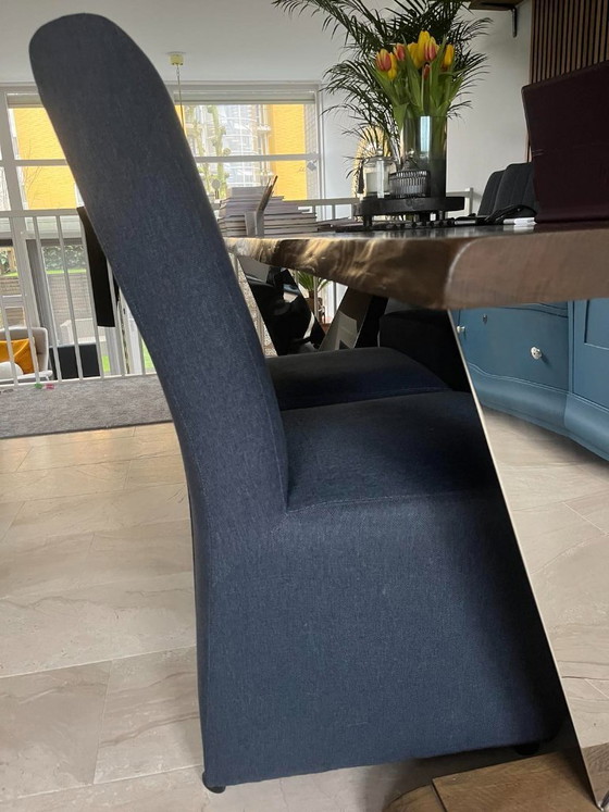 Image 1 of 6 luxury dining chairs with chrome wheels