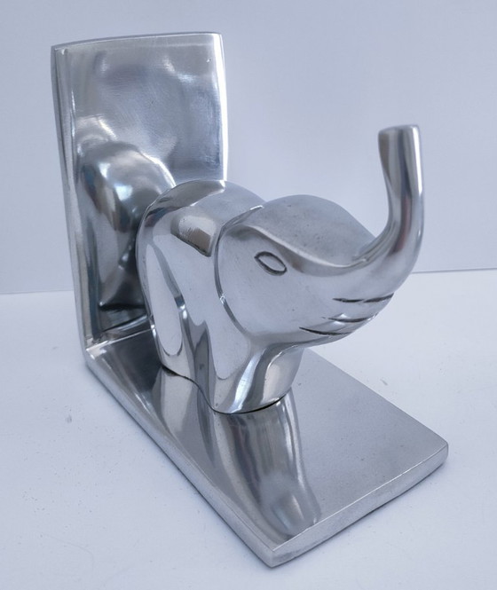 Image 1 of een paar boekensteunen in de vorm van olifanten, gegoten aluminium
