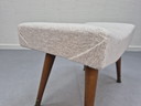 Vintage footstool, wood with brass legs.