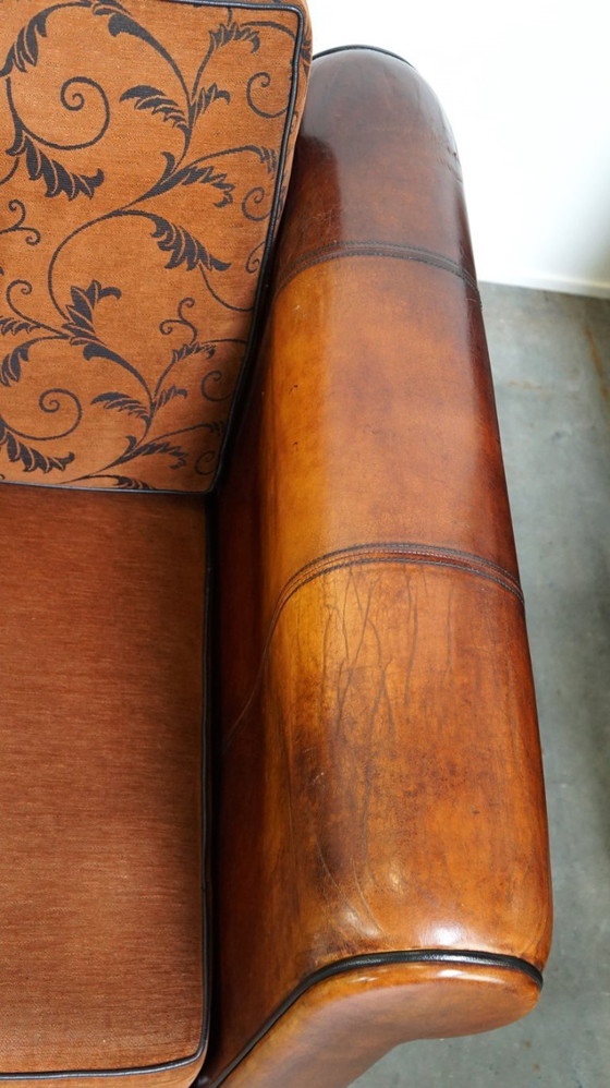 Image 1 of Cómodo sofá de piel de oveja de 2,5 plazas con cojines de tela