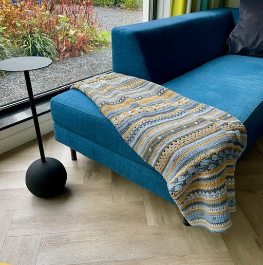 Scandinavian handmade crocheted rug in blue, gray and ochre