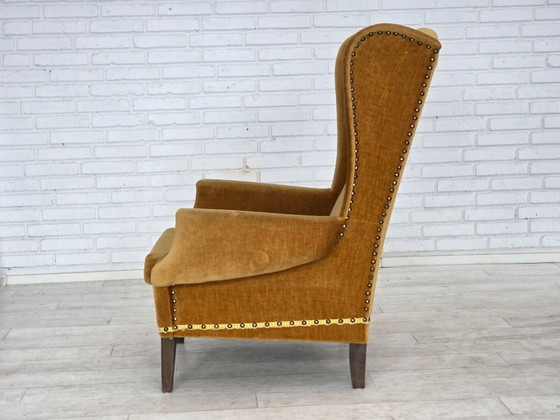 Image 1 of Deense fauteuil met hoge rugleuning uit de jaren 70, bekleed met meubelvelours en voorzien van eikenhouten poten.