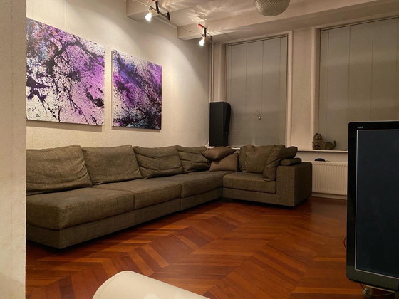 Image 1 of Canapé d'angle modulable Natuzzi 5 éléments et repose-pieds avec plateau en verre