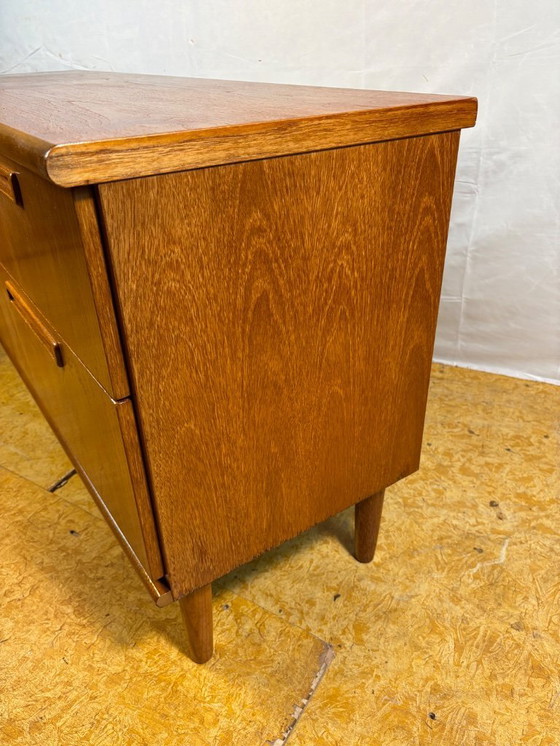 Image 1 of Mid-century retro vintage teak sideboard by Meredew 1960  This elegant teak sideboard by Meredew is a superb example of mid-cent