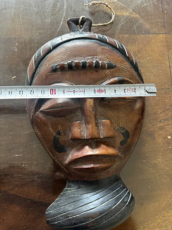 Image 1 of Petit masque Africain en bois sculpté début XX e siècle