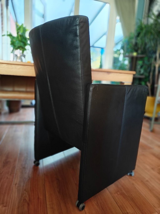 4x Chaises en cuir noir