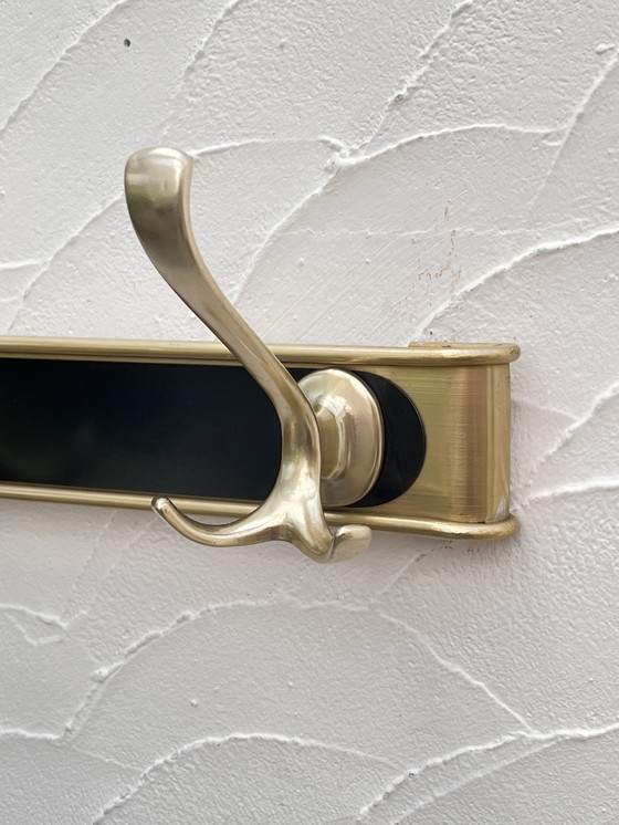 Image 1 of Kleiderständer aus goldfarbenem Aluminium